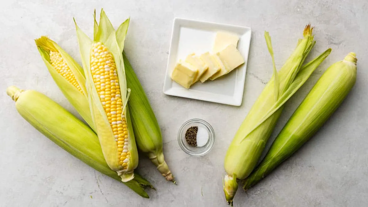 Instructions for barbecuing corn on the cob in foil.
