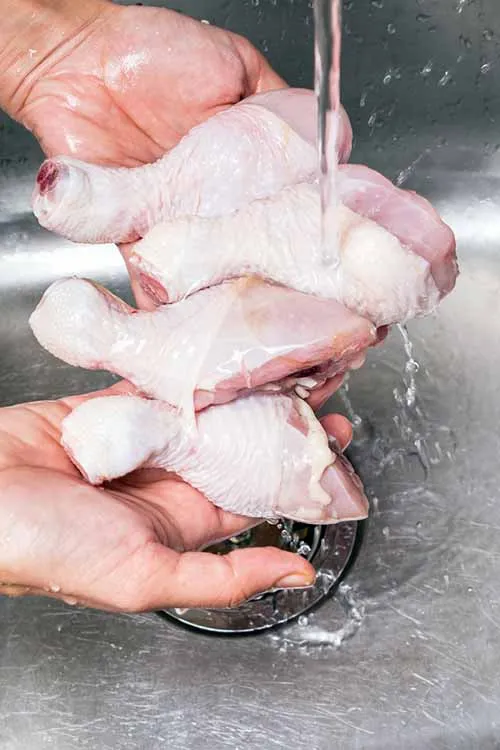 rinsing your chicken under cold water and drying it thoroughly with paper towels