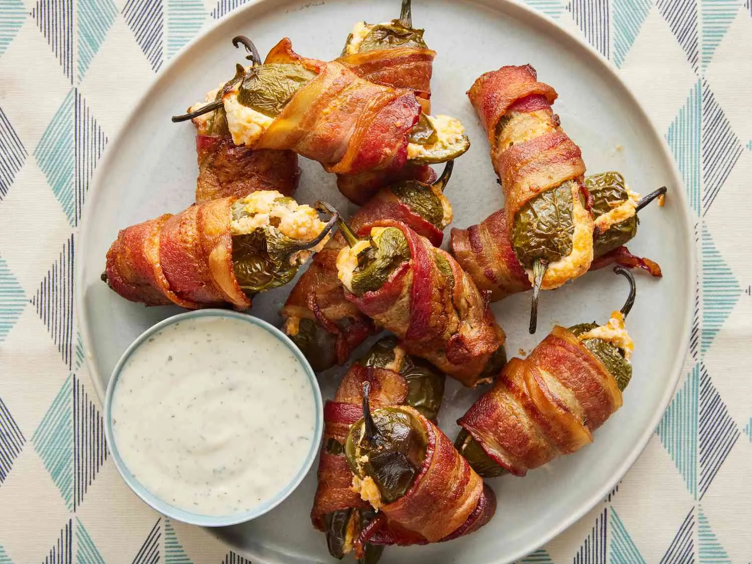 BBQ Bacon-Wrapped Jalapeño Poppers Serving with dips ,salad and drink