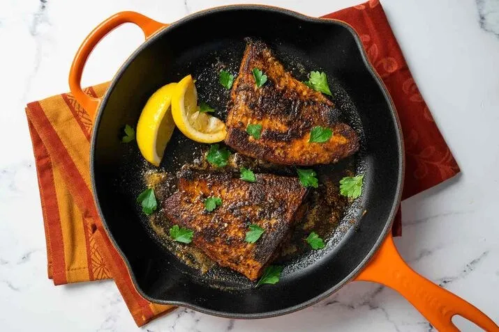 Blackened Catfish With lemon garnish 